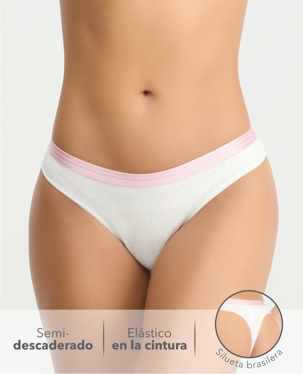 Panty brasilera blanca con puntitos y elástico rosa, diseño semidescaderado de la marca St. Even Colombia.