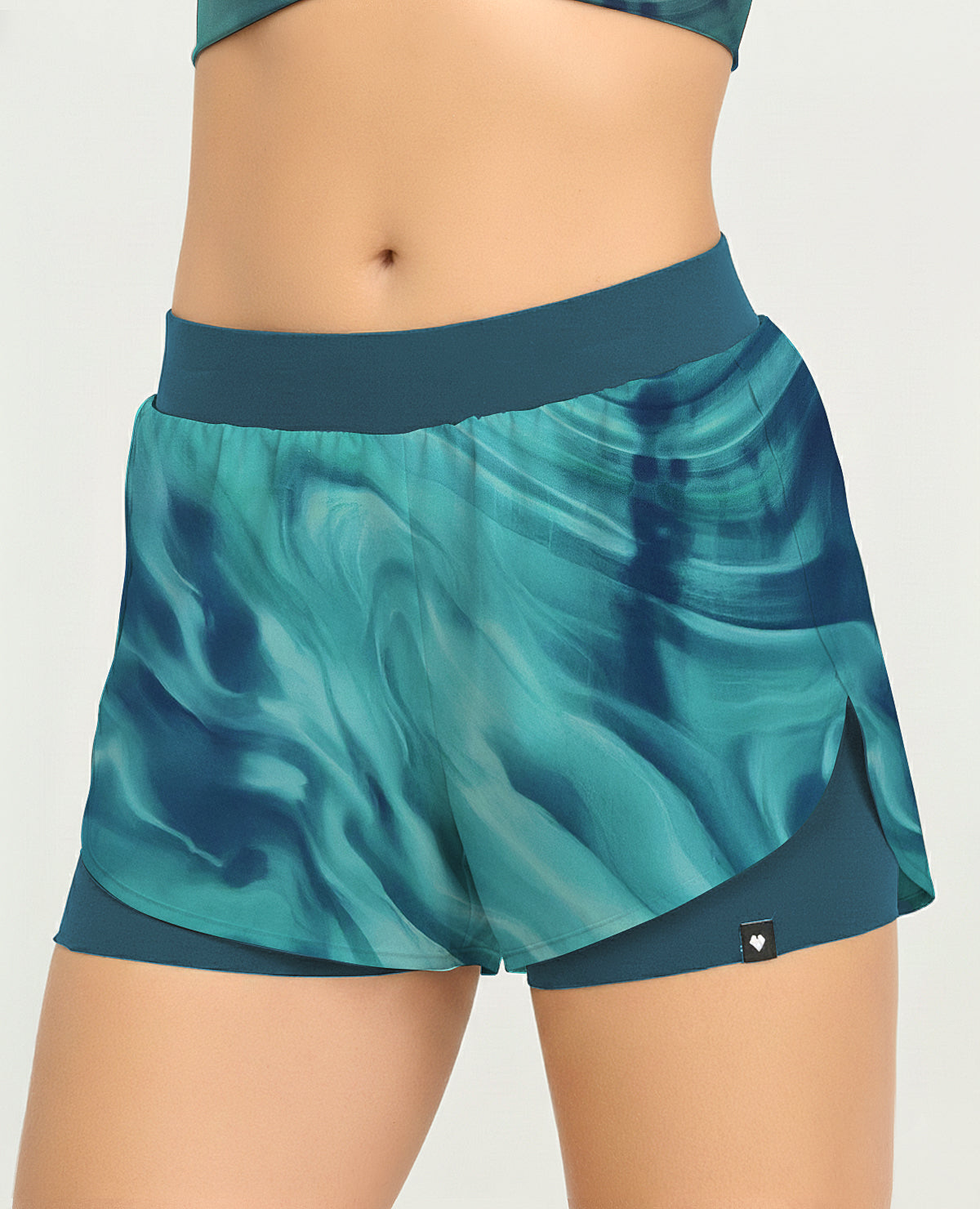Short deportivo para mujer con estampado azul silueta amplia y short interno ajustable de St. Even.