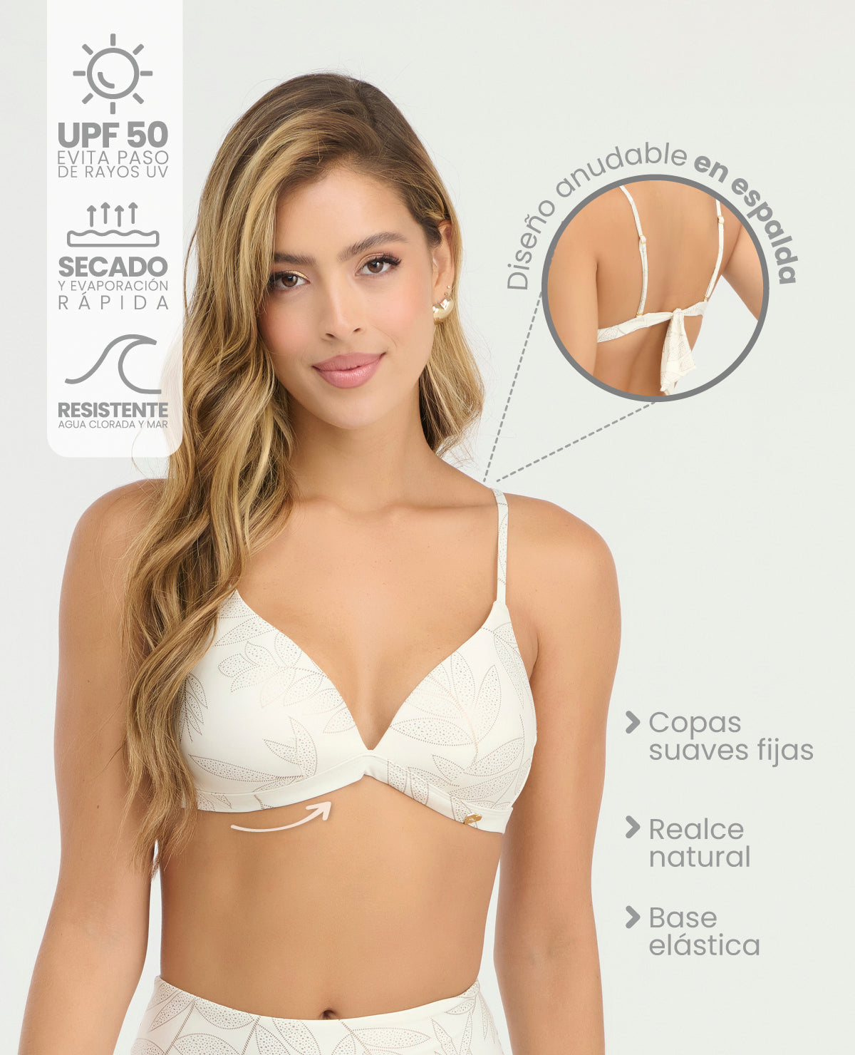 Brasier de baño color ivory con copas fijas, realce natural y diseño anudable en espalda con protección UPF 50.