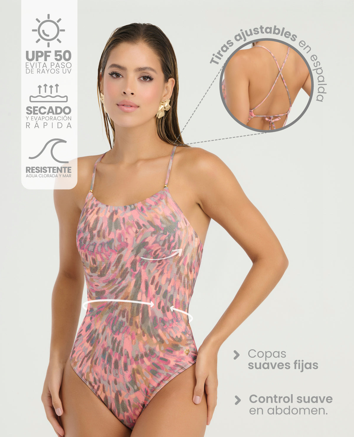 Vestido de baño enterizo rosado con control de abdomen, copas fijas y tiras ajustables cruzadas en la espalda.